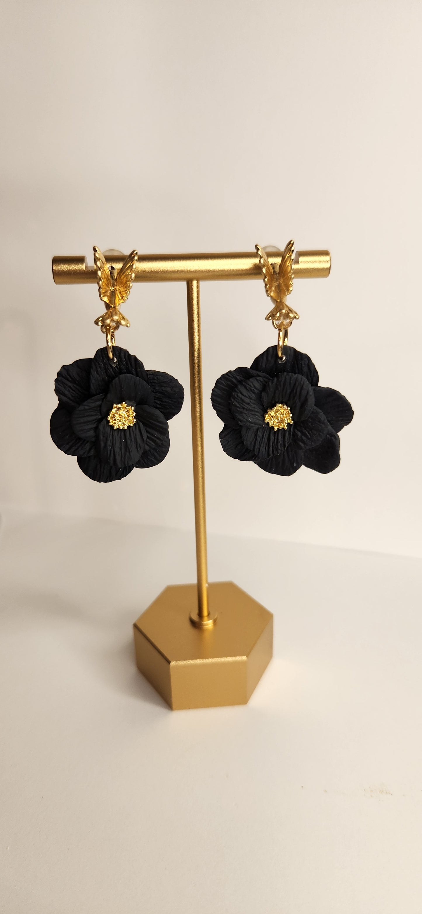 Gold Hummingbird with Black Flower